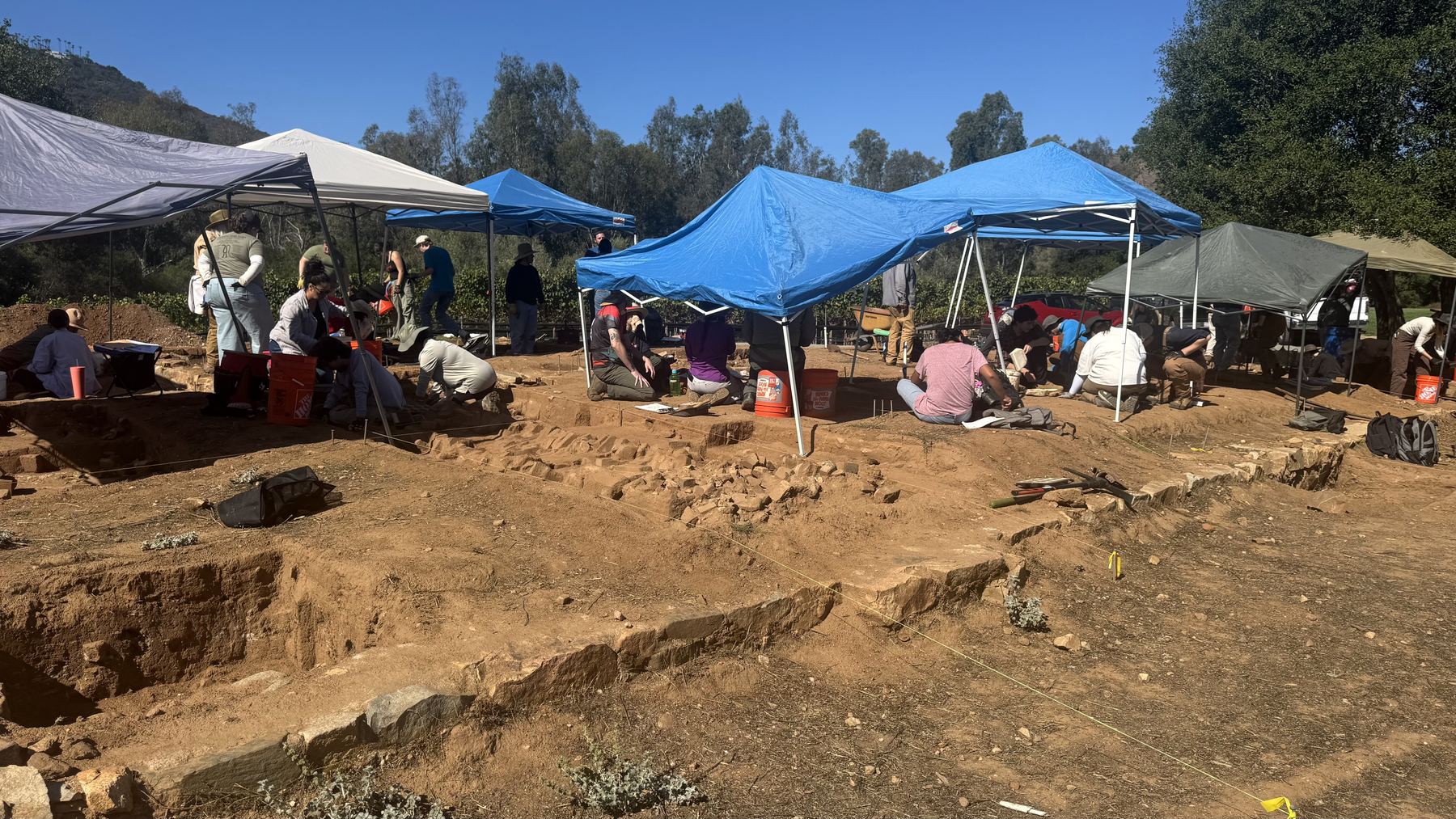 Excavation units along the recovered stone foundation, October 2025