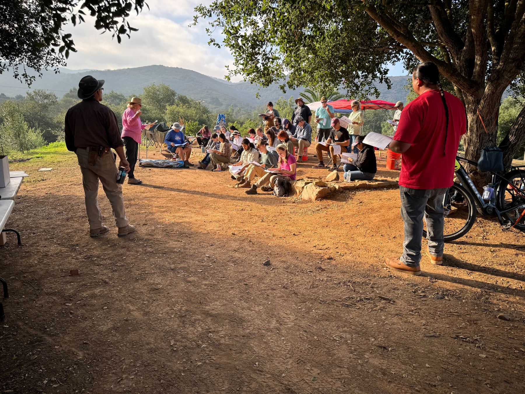 Morning lecture under the oaks during the Palomar field school